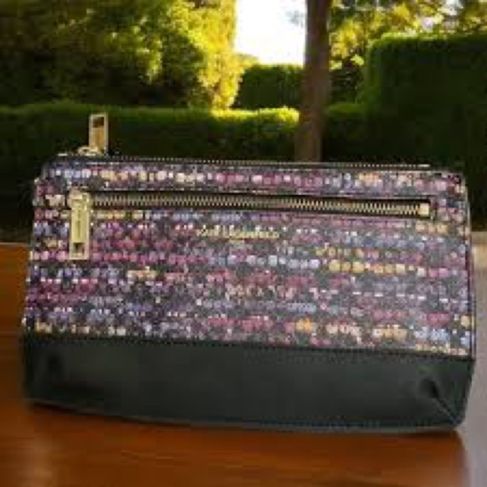 Karl Lagerfeld Paris Double Zip Wristlet Pouch Clutch in a plum combo print.